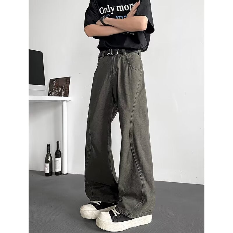 Vintage washed denim jeans with distressed lines for men